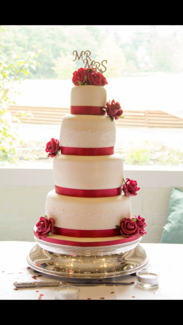 Red and white fondant covered - The Crumby Bakery