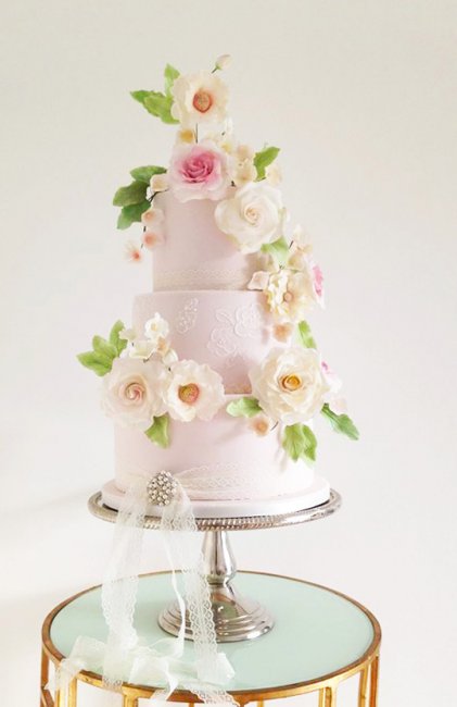 Sugar Roses on this Rose Quartz and lace wedding cake - Cobi & Coco Cakes
