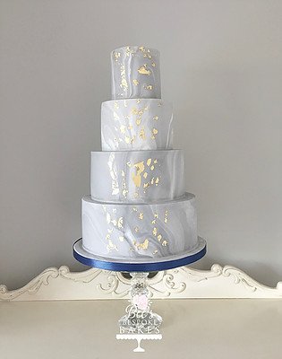 Dare to be different with our striking four tier marble cake. With crips edges and gold leaf detail, this cake is guaranteed to impress - Bee's Bespoke Bakes