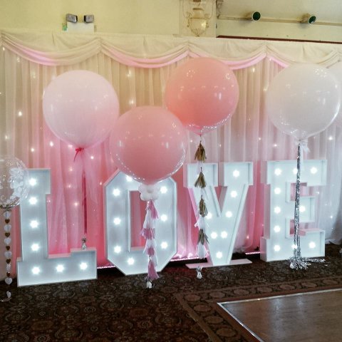 Giant 3 foot latex balloons with tassels tails, tulle covered latex balloons - Balloon and party Kingdom