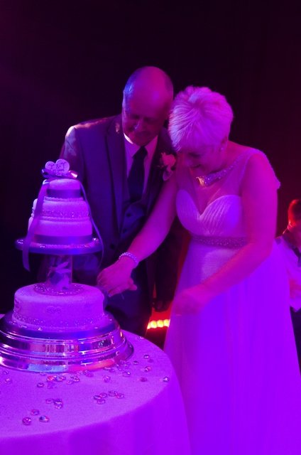 Cutting the Cake (Atmospheric lighting) - Michelle Kemp Photography