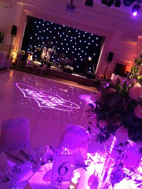 Logo projection and stage backdrop - Lighting for Weddings 