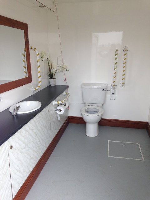 Luxury Accessible unit - Providing the same luxury toilet facilities for guests with impaired mobility. This unit also has baby changing facilities - Kniftons' Mobile Toilets Limited