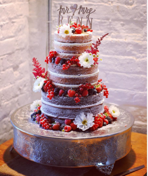 Naked wedding cake with fresh flowers and berries - Little Bear Cakery