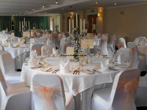 chair covers with organza sashes (also available in satin) and our candelabras which are available for hire - Forget Me Not Blooms Balloons Occasions
