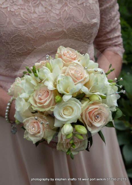 rose and fresia handtied bouquet - flower-expressions ltd