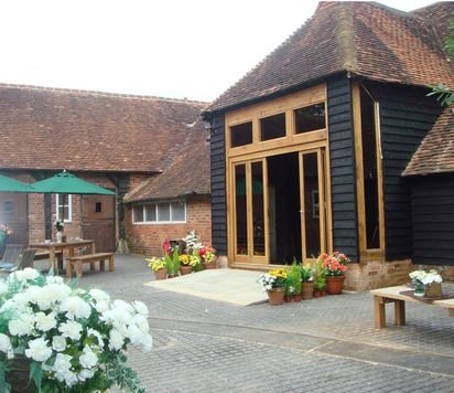 The wedding barn and courtyard - Herons Farm