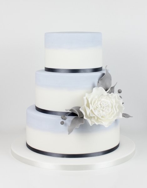 watercolour painted tiers with open sugar flower - Fay's cakes