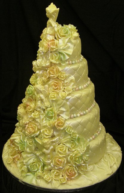 Five tier chocolate cake with cherubs and roses - Cakes Unlimited of Yorkshire