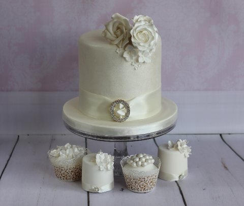 All white cutting cake with matching cupcakes & mini cakes - Sticky Fingers Cake Co