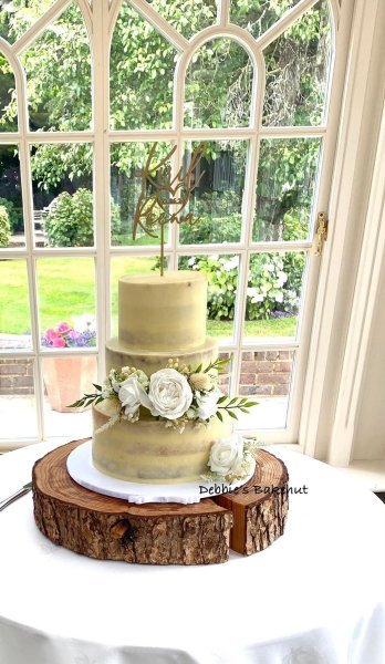 A 3-tier semi - naked wedding cake - Debbie’s Bakehut