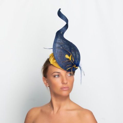Extravagant blue and yellow headpiece with feathers. - Katherine Elizabeth Millinery
