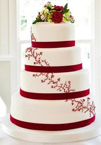 No.682 A four tier cake with embroidery and a sugar flower topper - Allison's Celebration Cakes