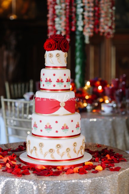 Ivory, red and gold - traditional colours for an Asian wedding. - Pat-a-Cake Parties