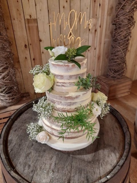 3 tier naked cake with fresh flowers - Speciality-Cakes