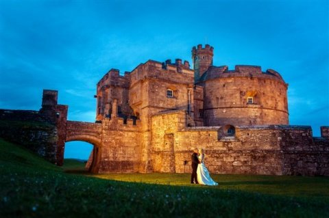 Newly weds infront of the floodlit castle - Pendennis Castle