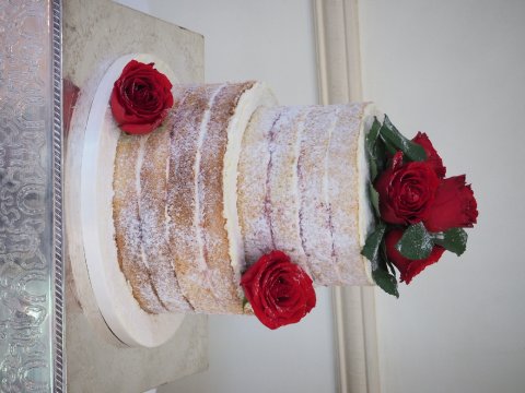 Naked style wedding cake with red roses - Sarah Louise Cakes
