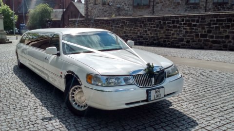 Stretch White Limousine - FIRST CLASS LIMOS PAISLEY