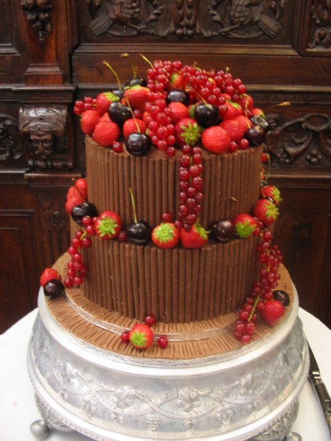two tier stacked cake with Chocolate curl decoration and fresh fruit - Elizabeth Ann's Confectionery