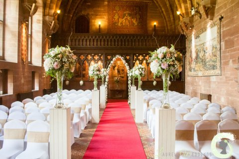 Ceremony arrangements and flower arch - Laurel Weddings