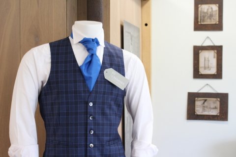 Blue check waistcoat can lift the look of a plain navy or royal suit - Chimney Formal Menswear