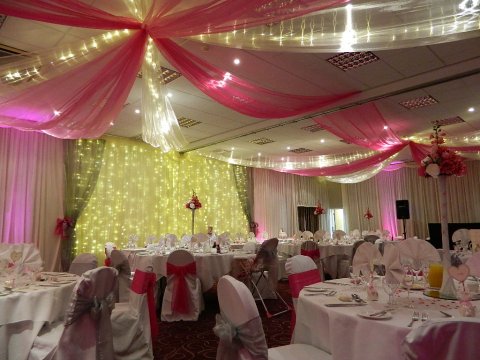 Organza ceiling swags - Party Linen Venue Decor Specialists