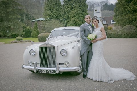 Bride and Groom in front of the period clocktower at Woldingham School, Marden Park Surrey by Stuart Hogben Photography - Marden Park Mansion