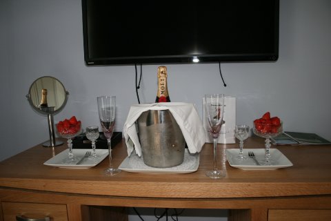 Champagne for the room? - Caemorgan Mansion