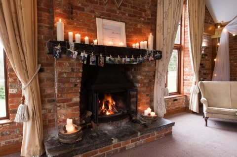 Oak beamed fireplaces add warmth in winter months - Westerham Golf Club
