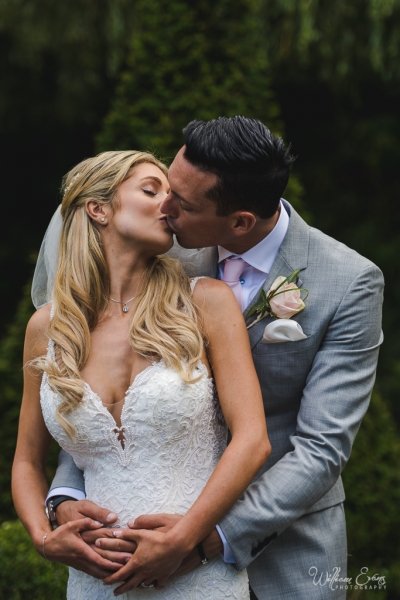 Bride and groom kissing - William Evans Photography