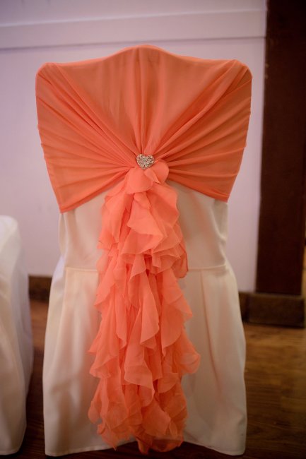 coral ruffle chair hood - Ellis Events - Creative Chair Cover Hire and Venue Styling
