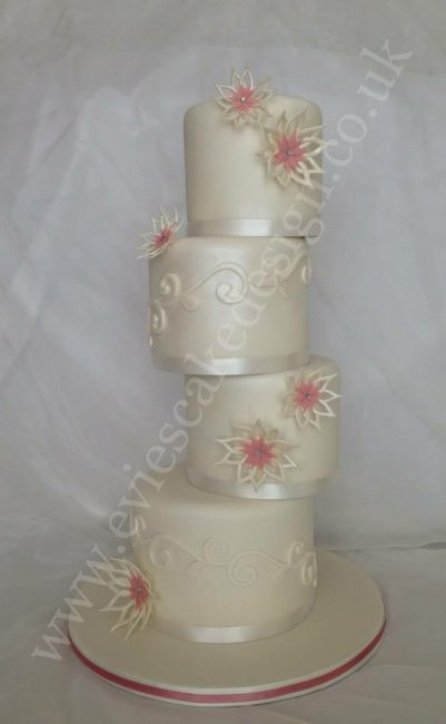 Wedding cake with staggered tiers - Evie's Cake Design
