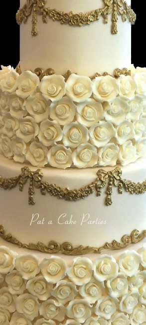 Ivory roses and gold details - Pat-a-Cake Parties