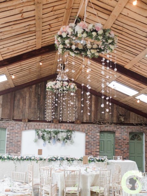 Hanging flower rings and top table flowers - Laurel Weddings