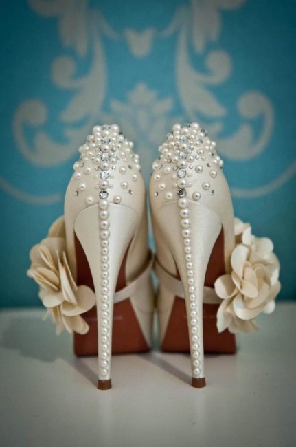 Design: Eternal Flower @ Nicky Rox. Shoes provided by the bride and customised with lots of sizes of pearls and Swarovski crystals. - Nicky Rox Designs