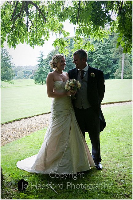 Bride and Groom enjoy a private moment at Chavenage - Chavenage House