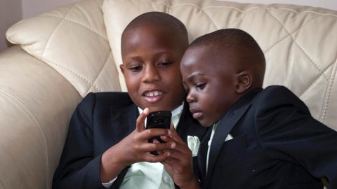Page boys more interested in their phones, of course!! - David James Photography