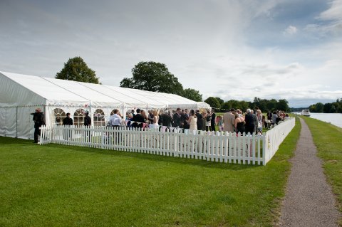 Wedding Marquee with Bunting and Picket Fence - Marquees Direct 