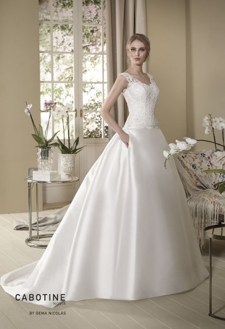 Low waist mikado wedding dress. Lace bodice with deep back neckline and semi-sheer straps. Princess skirt with pleated back and side pockets. - GN DESIGN GROUP
