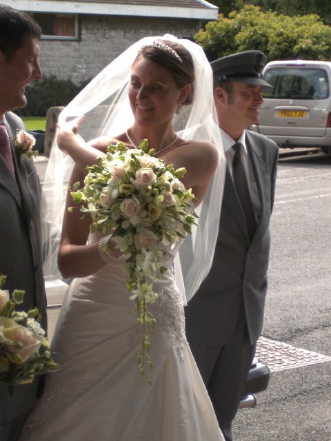 shower bouquet of champagne roses, dendrobium orchids, cream lizianthus - Yorkshire rose florist