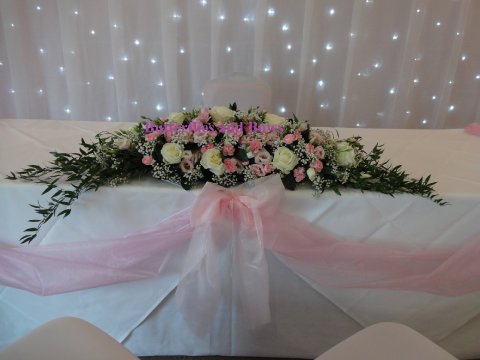 pink and white ceremony / top table flowers - Butterflies and Bows