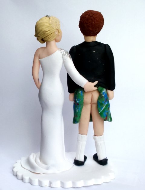 Back view of Cheeky bride lifting the kilt topper - sweetmoontoppers.com
