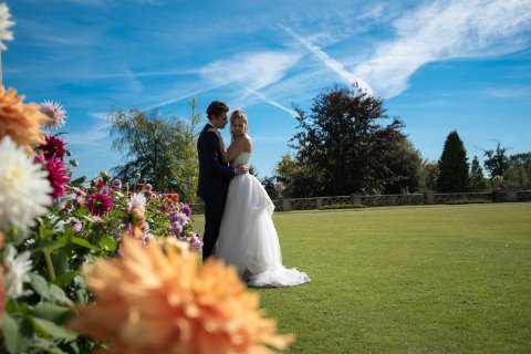 Sunny Day lovely couple pretty flowers - S G Hepworth Photography