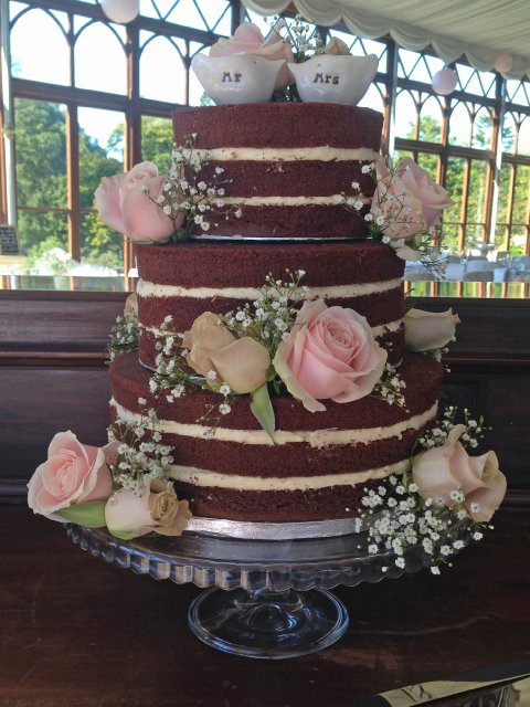Luscious three tier chocolate naked wedding cake with fresh roses and gypsophilia - Rebecca Gilmore Wedding Cakes