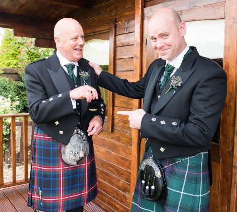 Groom and best man with rings - GE Photography