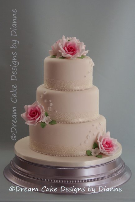 3 Tier White Wedding Cake wth pink sugar roses and delicate white blossoms - Dream Cake Designs (Dianne Stanley)
