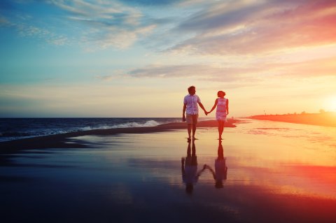 Couple walkig on beach - Your Way (Travel) Ltd