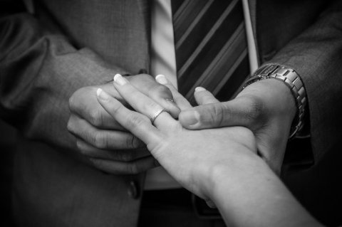 Placing the ring - Narshada Photography