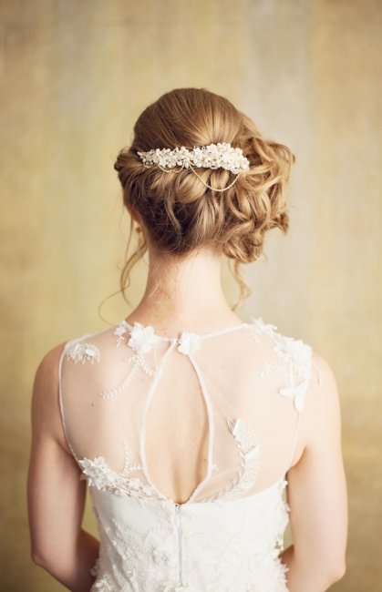 'Lili' floral hairpiece. This versatile hairpiece can be worn at the back of the hair or to the side. The intricate detailing and pretty draping chain make this a stunning bridal accessory. - www.pswithlove.co.uk