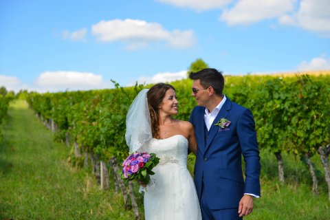 couple photos in the vineyard - French Wedding Chateau 